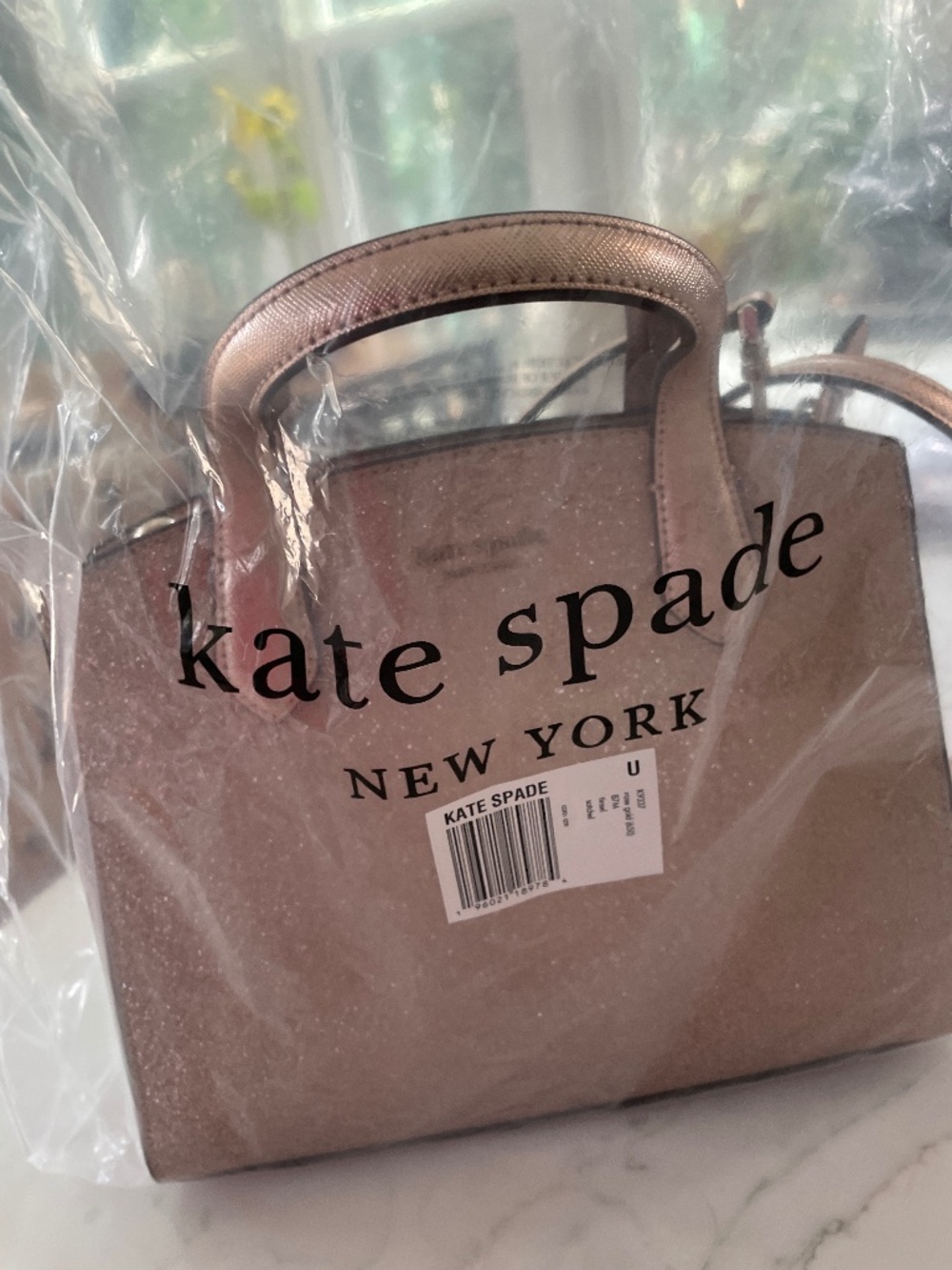 Kate Spade rose gold purse